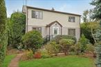 This impeccably maintained Colonial shows pride of ownership (50 Years) and is nestled on a quiet dead-end street. As you enter, you will notice a flexible floor plan with generously sized living room-great for family gatherings. Additionally, there is a full bath, kitchen with ample wood cabinetry and stainless-steel refrigerator, dining area with sliders leading to covered deck with stairs leading down to patio, and family room. Indoor and outdoor spaces connect easily with private covered deck with stairs down to lovely gardens and level yard with mature plantings for complete privacy. The second floor boasts primary bedroom, hall bath and 2 additional bedrooms. Basement is unfinished with 1/2 bath, and storage room with door out to yard. Some extra features-cast iron baseboard on 1st floor, mini splits in 2 bedrooms, wall A/c&rsquo;s in family room and primary bedroom, pine wood flooring on 1st level. A peaceful location, yet close to schools, shops, restaurants, buses, park, and major highways. A pleasure to show.