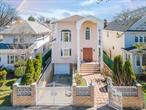 Welcome to this stunning high-ceiling, 2005 custom-built Colonial located in the heart of Flushing.This beautifully crafted home offers 4 bedrooms, 2.5 baths, and 2, 392 sq. ft. of interior living space, plus an approximately 1, 100 sq. ft. basement. The property sits on a 36.42 x 100.83 lot and showcases incredible craftsmanship throughout.? Location Highlights:    â€¢    Just 15 minutesâ€™ walk to the LIRR Murray Hill Station    â€¢    Only 1 block from the Q65, Q26 & Q27 bus lines    â€¢    Minutes from Downtown Flushing and local supermarketsDonâ€™t miss this rare opportunity â€” schedule your private tour today!