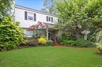 Situated perfectly in the middle of a 100â€™ x 100â€™ property, this traditional center hall Colonial offers privacy and location with all of the modern touches. Located in one of the most desirable areas of Woodmere, it offers 2, 495 sq. ft. of living space plus an additional 761 sq. ft. of space in the Finished Basement. The Entrance Hall offers two coat closets for family and guests as well as a Powder Room. The first floor includes a formal Living Room with a wood burning fireplace, a Den, and formal Dining Room. In addition, it boasts a completely renovated and updated Kosher Kitchen, a bright and sunny Breakfast Room with a Coffee/Service Bar, walk-in Pantry and access through a mudroom to the 1.5 car Garage. The second floor offers a large Primary Suite with Linen Closet, Full Bath, Walk-In Closet and Built-In Storage. There are three additional Bedrooms and another Full Bath and Linen Closet on the floor and a pull-down staircase provides access to storage. The Finished Basement offers a large Family Room, a Full Bath, a Laundry Room and an additional room along with more storage space. Outside, a large Trex Deck and spacious back and side yards offers plenty of room for entertaining and family fun. Come see this wonderful property soon!