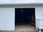 Warehouse/Garage space available in Milton, NY; conveniently located near major highways and cities. Located on Milton Turnpike, just a mile off of US Highway Rt 9W in Milton, NY is this available warehouse space. Space is 1, 200 sq ft of continuous space with concrete walls and flooring. Ceiling height is 14 feet. Free up your garage or add additional space for your business. This warehouse is close to Poughkeepsie, Newburgh, Kingston, and New Paltz. Reach out today for more information!