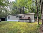 Welcome to 4 Schwabie Turnpike, perfectly situated near the charming communities of Kerhonkson, Stone Ridge, and Olivebridge.This immaculately maintained 960 sq. ft. manufactured home is ready for its next chapter. Nestled on over three pristine acres in the hamlet of Samsonville, the property offers the perfect mix of woodland privacy and usable outdoor space. Surrounded by lush mountain laurels, with a sweeping cleared lawn and a meandering driveway, this setting is ideal as a weekend retreat, downsizing opportunity, or full-time residence.Inside, enjoy easy one-level living with an open living/dining/kitchen layout, two bedrooms, one bath, laundry area, a welcoming front deck, and a covered back entry. Recent updates include a new refrigerator and stove, plus a newer roof and skylightâ€”so you can move right in with peace of mind.The property is well-equipped with multiple outbuildings: a two-car covered carport, three sturdy sheds, and a container-style, electrified workshopâ€”perfect for hobbies, storage, or creative projects.Central to everything the Hudson Valley has to offerâ€”from the Catskills and Gunks for world-class hiking, to Belleayre and Hunter for winter sports, to Woodstock, Stone Ridge, Accord, and Ellenville for shopping and dining. Plus, you&rsquo;re just minutes from local favorites like Ravenwood, Inness Resort, Arrowood Brewery, and Westwind Orchard to relax and sample what the region has to offer.Don&rsquo;t miss this little gemâ€”it won&rsquo;t last long!