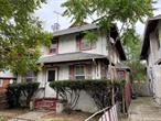 This well-built 1920 colonial has stood the test of time and offers endless potential. The home is currently a legal 2-family but could easily be utilized as a single family if preferred. It features spacious rooms with high ceilings, lots of windows, original architectural details, such as wood floors, moldings, and a wood-burning fireplace. There are 6 total bedrooms, 4 on the main floor and 2 upstairs, one of which has a bonus room attached. Both levels have a full bathroom. The full basement is currently unfinished, allowing you to envision a space that suits your needs. The roof is 10 years old. The home does need some renovating, but it is a diamond in the rough that has great bones and character that are hard to find elsewhere. Far Rockaway offers a unique blend of urban convenience and suburban charm, with easy access to public transportation making commuting throughout the city simple and efficient. The neighborhood is home to several parks and outdoor spaces like Bayswater Park, Dubos Point Wildlife Sanctuary, and Rockaway Beach providing residents with opportunities for recreation and relaxation. A variety of local dining options, shops, and essential services are just minutes away, along with access to quality schools, community centers, and houses of worship. Ongoing development and revitalization efforts continue to bring new energy to the neighborhood, making it an increasingly desirable place to live.