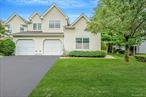 Welcome to The Lakes â€“ a highly sought-after gated community in East Setauket, within the award-winning Three Village School District! This stunning, move-in ready, corner unit townhome offers 3 bedrooms, 2.5 baths, and serene lake views. Step inside to a dramatic living room with soaring ceilings and an open flow to the formal dining room, complete with sliders to a brand-new private patio on the lake â€“ perfect for entertaining or relaxing outdoors. The eat-in kitchen features a breakfast bar, gas cooking, and ample cabinetry. The main-level primary en-suite impresses with vaulted ceilings, a walk-in closet, and an updated full bath. An updated half bath, convenient laundry, access to the attached 1-car garage, and an entry foyer complete the main level. Upstairs, an airy loft space overlooks the living room and dining area, offering a secondary living space. Two additional bedrooms and a beautifully updated full bathroom complete the second floor. Enjoy the lifestyle The Lakes is known for, with amenities including a clubhouse, fitness center, library, multiple in-ground pools, a new playground, pickle ball, walking paths and more â€“ all in a secure, well-maintained community. This is more than a home â€“ itâ€™s a lifestyle! Donâ€™t miss your chance to own this rare corner unit with lake views in one of East Setauketâ€™s most desirable neighborhoods!