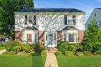 Turn-Key, Truly One of a Kind! This Beautiful Brick Colonial Sits on 50x115 Lot and Offers Outstanding Curb Appeal. Lovely Brick Paved Patio Off Kitchen with A Gorgeous View of an Expansive Backyard....Perfect for Relaxing or Entertaining. As You Enter thru the Front Door, you are Greeted by a Beautiful Large Living Room with Wood-Burning Fireplace, Formal Dining Room and Eat-in-Kitchen with Wooden Cabinets, Granite Counter Tops, Stainless Steel Appliances and Beautiful Breakfast Nook that Has Sliding Doors to the Lovely Backyard. There is also a 1/2 Bathroom on the 1st Floor. As You Walk up the Wooden Staircase to the 2nd Floor, You Will Find a Spacious Master Bedroom, and 2 Very Large Bedrooms. There is a Full Bathroom and a Pull-Down Ladder to Enter the Attic. The Basement is Very Large. with Large Windows. Also, 2 Zone Gas Boiler and Water Heater, both 6 yrs. Old, 200 Amps, 5 Zone Sprinkler System, New Roof, Gutters and Garage Door, both 5 yrs. Old. Close To Village Park, Shops, and Restaurants. Only Blocks Away from L.I.R.R. Train Station (35 Mins. To Manhattan). Taxes Before Basic STAR Reduction $16, 118.45 (S.T.A.R. $ 751.34) Total Taxes After the STAR are $15, 366.86