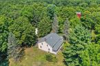 Step into the timeless beauty of 441 North Ohioville Road in New Paltz, where history and nature converge.Set on 69 acres of rolling fields, wooded trails, and wide-open skiesâ€”just minutes from the vibrant villageâ€”this 1860s farmhouse offers warmth, character, and endless possibility. With 2, 100 square feet of living space, this home blends the soul of a historic homestead with the peace and privacy of country living.Inside, youâ€™re greeted by wide-plank wood floors, exposed beams, and vintage details that create an atmosphere of authenticity and comfort. The kitchen retains its original charm, with a vintage brick hearth, cheerful yellow appliances, natural wood cabinetry, and hand-laid tile floorsâ€”a nostalgic nod to simpler times.The living and dining rooms are spacious yet intimate, filled with warmth and personality. The flow is open, but every corner tells a story, with details that honor its 19th-century roots. With four bedrooms and two full bathsâ€”one on each levelâ€”thereâ€™s room to breathe, host, and grow. Each space invites you to slow down and settle in.Outside, the magic continues. A sun-drenched patio and an in-ground pool offer a perfect place to unwind or entertain, all surrounded by mature trees that give the space a secluded, storybook feel. Stroll the private trails that wind through meadows and woods, or enjoy quiet moments under the centuries-old maple.Two picture-perfect red barns add to the charm and functionality of the property. Whether you dream of an art studio, workshop, event space, or simply a backdrop for sunsets and summer gatherings, the potential is here. A brand-new roof adds peace of mind, and the location strikes a perfect balanceâ€”close to town, yet enveloped in nature.Whether youâ€™re seeking a full-time homestead or a weekend retreat, 441 North Ohioville Road offers a rare combination of privacy, beauty, and inspiration. After almost 60 years in the same family, this property is more than a homeâ€”itâ€™s a legacy ready to be embraced by its next stewards. Come discover the tranquility and potential of this farmhouse and make it your own sanctuary, in the heart of the Hudson Valley.