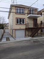 Custom new construction currently setup as a two family in R3A zoning Howard beach. Radiant Heat, Navian boiler on each floor. Custom kitchen, baths, lighting and tiling. Custom fixtures and trims. Detached garage and ample parking. 24X7 bus, 3 mins from A train/JFK air train, playground and beach city views. Great buy for investment or owner occupied living. May not last!
