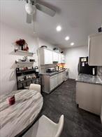 Spacious 2-bedroom co-op in the heart of Hartsdale! This oversized unit offers approximately 1, 200 sq. ft. of living space, featuring a kitchen with granite countertops, recessed lighting, wood-grain tile flooring, and a decorative tile backsplash. The bathroom includes both a separate bathtub and a stand-alone shower. Enjoy ample storage with four large closets! The living room is enhanced with custom motorized blinds and this unit comes with an assigned parking space. Hartsdale Gardens is a beautifully maintained prewar building with a live-in superintendent and a full-time porter, ensuring a spotless environment. Residents can take advantage of amenities such as a playground, basketball court, BBQ/picnic area, and a full-size card-operated laundry facility with carts. Conveniently located just minutes from Hartsdale Village and the the Hartsdale MetroNorth station with an easy 35-minute train ride to Grand Central Terminal. Nearby shopping includes Trader Joeâ€™s, Starbucks, and Home Goods