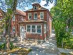Welcome to this well-maintained, fully detached brick two-family home located on a quiet, tree-lined street in the Wakefield neighborhood of the Bronx. This property can be delivered vacant and features a 2-bedroom unit with a front balcony over a 3-bedroom unit, plus a finished walkout basement offering additional living space with 2 rooms and full bathroom. Each unit has its own brand-new gas furnace and water heater with transferable warranty. The newly cemented backyard and extended driveway comfortably accommodate multiple vehicles. Recent upgrades include new front windows, rear brick pointing, and a modern leaf-guard gutter system installed in 2024. Ideally located near local bus lines, less than a mile from the 2 and 5 trains, and close to the Bronx River Parkway for convenient access to Westchester and Manhattan.
