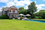 Set on a sprawling builderâ€™s acre, this newly updated residence is a rare find just moments from Bridgehampton Village and the Hampton Classic. Thoughtfully designed for both comfort and elegance, this five-bedroom, five-and-a-half-bath home offers the perfect blend of luxurious living and modern convenience.The sun-drenched open living spaces seamlessly flow into a designer kitchen, creating an inviting atmosphere ideal for entertaining. With two primary suitesâ€”one on each levelâ€”and three additional spacious ensuite bedrooms, this home is designed to accommodate guests in style, with generous closets and refined finishes throughout.Step outside to a breathtaking outdoor oasis, where expansive decks and a serene patio overlook a beautifully landscaped pool area. The property is perfectly positioned to capture stunning Hamptons sunsets, offering a tranquil retreat for relaxation and gatherings. There is also room for an additional pool house or garage, enhancing the homeâ€™s future potential.The fully finished lower level provides even more versatile living space, featuring a large family room, private office, additional bedroom, and full bath, making it ideal for work, leisure, or hosting guests.A rare opportunity to own a turnkey luxury home in one of the Hamptonsâ€™ most coveted locations, this property is designed for effortless indoor-outdoor living.