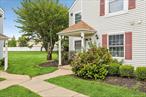 Lovely Well-Maintained Upper Level Corner Unit. Features include Spacious Living Rm./Dining Area. Kitchen with Granite Counter Tops. 2 Bedrooms and 2 Baths including a Master Suite, Spacious Closets, Private Washer/Dryer Units. Use of the Community Clubhouse, Swimming Pool and Tennis Courts and more.