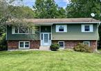 What a great opportunity to own a comfortable home on cul-de-sac with municipal services! 3 spacious bedrooms, 2 full baths, contemporary open kitchen with granite counters and custom cabinetry, fabulous enclosed porch and a wonderful property for outdoor entertaining! Located within a short driving distance to schools, shops, restaurants, train station, Dutchess Rail Trail and other everyday conveniences. Above ground swimming pool will be removed prior to closing.