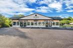 Prime investment opportunity in the heart of the North Fork! Located directly on Route 25 with exceptional visibility and high traffic counts, this recently updated commercial property features 6 versatile units ideal for retail shops, professional offices, or service-based businesses. The building is well-maintained and move-in ready, offering a turnkey investment with strong income potential. Favorable zoning provides flexibility for a variety of commercial uses, making it an attractive option for investors and business owners alike. With its central Main Road location, modern upgrades, and steady exposure, this property is a rare opportunity to secure a stable asset in one of Long Islandâ€™s most desirable business corridors.