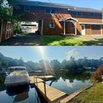 This stunning creek-side home offers a perfect blend of tranquility and modern living. Nestled on the Esopus creek with Hudson River access, this is the perfect location for boat, water and nature enthusiasts. The property features, 3 bedrooms, 3 full bathrooms, office, a family room with a wet-bar, living room, dining room, laundry room.... Hard wood floors, numerous windows and sliders that bathe the interior with natural light. Brand new kitchen with quartz countertops. The master bedroom features a spa-like bath with soaking tub along with a California walk-in closet. Step outside to enjoy the expansive deck overlooking the creek, complete with private docks (25 ft depth) for boating, fishing or swimming Slip into the backyard hot tub for relaxation or take a stroll to the picturesque lighthouse. Just a mile from the beautiful village of Saugerties, this home is the perfect blend of entertaining, relaxing and enjoying all that Saugerties has to offer.