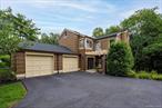 Welcome to 107 Treetop Circle located in the Clarkstown School District! This Spacious Tri-Level 2BR, 2.5 Bath Townhome features an outdoor sitting area prior to entry for those summer nights, upgraded large modern kitchen with a sleek design that flows into a dining room that opens up to an outdoor terrace. The high-ceiling living room features a trendy fireplace that has reclaimed wood surrounding it, next to it is a large bay window which brings in a lot of natural sunlight. Upstairs, youâ€™ll find a generous Master Bedroom full of space, bay window, with a Master Bathroom that features a full walk-in wardrobe room before you reach the lavatory and full bath. The next Bedroom has an open concept where you can have a bed and extra space for an office or whatever your creative mind desires! The Roof was just updated in 2024! The Full Basement includes a laundry room, and a very spacious room that can be used for a family room/spare room, game room, or more! It has ample storage, and has a walk-out glass door to patio and backyard. If you or your family likes activities this community boasts a ton of amenities such as Basketball and Tennis courts, Playground for children, Pool, and a Clubhouse! Nanuet has lots of hiking trails for those of you who love nature! So, if you love the outdoors, and love doing a ton of fun activities... come check out 107 Treetop Circle, wonâ€™t last. Heat, Hot Water, Water/Sewer, Trash and Snow Removal included in HOA.