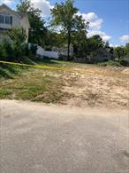 Vacant land located in the rapidly evolving town of Wyandanch, with enhanced infrastructure. This property is conveniently situated just minutes from the bustling Wyandanch Plaza on Station Rd (Near the LIRR). Buyers should be aware that a variance will be required for development