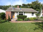 Stylish Ranch Living in the Heart of Patchogue Village! Step into this expanded, 1, 200 sq. ft. Ranch that blends low-maintenance living with modern styleâ€”perfect for first-time buyers, downsizers, or anyone seeking a condo alternative with more space and privacy. Inside, youâ€™ll love the open-concept layout anchored by a vaulted-ceiling living room, where skylights flood the space with natural light. A cozy wood-burning fireplace and recessed lighting create the perfect setting for both entertaining and quiet nights in. The brand-new eat-in kitchen is a showstopperâ€”complete with shaker cabinets, quartz countertops, subway tile backsplash, and stainless-steel appliances. Just off the kitchen, a first-floor laundry adds everyday convenience. Both bedrooms are generously sized to fit a king bed, with the primary bedroom featuring new vinyl flooring, a walk-in closet, and an additional double closet. Gleaming hardwood floors carry through the main living areas and guest bedroom, while the full bath shines with a modern tile design and a oversized, custom vanity. Convenient updates provide peace of mind, including a young heating system with central air, roof, vinyl siding, and Andersen windows. Outdoors, enjoy a detached garage & attractive shed for additional storage, in-ground sprinklers, and a sprawling .26-acre yard with an oversized deckâ€”ideal for summer gatherings. Freshly painted and move-in ready, this home puts you within walking distance of local parks, the Great South Bay, dining, and just a mile from vibrant Main Street Patchogue!