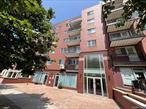 Welcome to this bright and spacious 2-bedroom, 2-bath condo located in the heart of Rego Park. This well-maintained home offers approx. 753 sq ft of comfortable living space with an open layout, oversized windows, and abundant natural light. The modern kitchen is equipped with stainless steel appliances and ample cabinet space, while the primary bedroom includes an en-suite bath for added privacy. Additional features include in-unit washer/dryer, hardwood floors, and generous closet storage.Built in 2012, the building offers an elevator, low monthly common charges. Conveniently located near Austin St shopping, restaurants, supermarkets, schools, and just minutes to E, F, M, R subway lines for an easy commute to Manhattan. A rare opportunity to own a move-in ready condo in a highly desirable neighborhood!