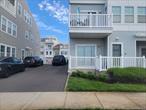 Large Bright Oceanfront 2 Bedroom 2bath Condo for Rent. This Rental Includes In Unit Washer / Dryer, A Rear Patio Deck for Lounging and BBQ, ng and also 2 private street parking permits. Steps to the Rockaway Beach and Boardwalk, and access to New Yorks only legal Surfing Beach.