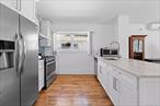 Opportunity Knocks! Rare to Find, once in a lifetime opportunity! 105-41 Seaview Avenue is a turn key, move in ready two family sitting on a 40x100 lot on a beautiful tree lined street of Canarsie. A rare to find amenity is the owners TRIPLEX! Yes you read right, 3 levels for the owner plus a rear unit rental unit! Perfect opportunity for large families looking for space!The owners unit features an expansive sun drenched, modern open concept living/dining area which provides great space for entertaining. Chefs granite kitchen equipped with floor to ceiling custom cabinetry, adorned with a full fleet of stainless steel appliances, and equipped with island for bar stool seating. 3 spacious bedrooms with ample closet space. The primary suite is equipped with a private en suite that boast spa-like finishes. Down the hall an additional fully tiled bathroom is shared between the additional bedrooms. The lower unit of the owners unit is currently equipped with a designated laundry room, and serves as the perfect home office space, gym, media den, storage space or additional recreational space.The rear unit is in equal condition and offers a 2 bedroom 1 bath apartment which can generate amazing rental income to assist with mortgage payments. Perfect for buyers looking for a mother/daughter setup.105-51 Seaview Avenue is conveniently located with close proximity which makes commuting a breeze. Short blocks to Rockaway Parkway, Flatlands Avenue, Shore Parkway, Belt Parkway. Quick Easy Access to JFK Airport. Stones throw to schools, shopping centers, restaurants, cafes, parks and many other vibrant neighborhood amenities.