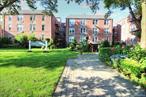 Welcome to this Junior 4 Corner Unit in a fabulous elevator building, The Harbor House a CoOp Association in the heart of East Rockaway Village. A newly renovated lobby greets you as you enter this building then you proceed to the elevator and to the second floor carpeted hallway to your corner unit. As you enter the units Bright Open Floor-plan featuring a Dining-room with a Walk In Closet and Storage Closet, a Large Living Room and expansive updated Eat In Kitchen with a Pantry Closet, White Cabinets, Dishwasher, Gas Stove and room for a table and chairs. Down the hall is an updated Full Bathroom with a walk-in shower and a king size Primary Bedroom with a triple closet. Hardwood floors throughout this entire unit and two ceiling fans. This unit also comes with a parking spot in the rear of the building and A large Laundry Room located on the lobby level. Close to US Post Office, Local Restaurants, Shopping and Long Island Railroad, parks and more.