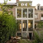A charming and playful Federal style c1830 townhouse on sought after Union Street, just a block from Hudson&rsquo;s main drag and the Amtrak station and just a 2h ride to NYC. The tall brick facade is accentuated with six-over-six windows in a beautiful creamy white. The back of the home is a stunning wall of glass, the house looks out into the private courtyard. The brick wall that originally served as the back of the house has doorways carved into it, a unique and beautiful architectural feature that breaks up the rooms that are otherwise open concept on the first floor. Soaring ceilings and exposed beams, gorgeous wood floors. The kitchen sits at the back of the house with a stunning stainless steel AGA range and soapstone countertops. The townhouse spans three floors and is flexible in its layout. There is currently one bedroom and a full bath on the second floor, with two flex spaces perfect for extra sleeping quarters or office/studios. The third floor makes up the master suite. It is open with vaulted cielings, a gorgeous, unpainted brick wall and a tadelakt soaking tub. Out back, a beautiful garden leads to a two-story carriage house. Currently used as an artist&rsquo;s studio, water and sewer have been run to the building. It is ripe for possibility. 10 Union Street is loft-style and metropolitan, a city house in the country.