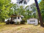 Unique Opportunity to purchase 2 dwellings on one lot. 1.17 acres in Glen Spey NY with level land within 30 minutes of many area amenities including Port Jervis commuter trains, buses, hiking trails, schools, library, farmers markets and the Delaware River for recreation. Property features a 1991 cottage with bedroom, living room, kitchen and bathroom attached to a 2 car garage. In addition there is a 1969 vintage mobile home with 1 bedroom, living room, bathroom, kitchen and enclosed front porch.  Mobile Home and Cottage need TLC so roll up your sleeves get to work ! Well worth the effort to repair these homes and make your home ownership dreams come true for a reasonable price! Only 2 hours NYC!