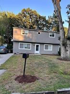 Totally Remodeled Expanded Cape with Permits Possible Mother Daughter with 5 Large Bedrooms, New Kitchen, New Bath, New Floors, New Boiler