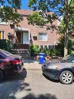 Legal Brick 2 Family dwelling in the Heart of Kew Garden Hills.  2 Bedrooms over 2 Bedroom plus a finished basement. 1 Car garage plus driveway.Renovated !!!!! Steps to shopping, houses of worship and public transportation.  A MUST SEE !!!!
