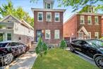 Wakefield Brick detached single family 3 bedroom duplex with living room, dinning room, Kitchen 2 full bath with finished basement and garage. Needs TLC