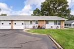 Beautiful End unit 2 Bedrooms 1.5 Baths 1 Car Garage and Heated Sunroom. New Heat Pump A/C (18 SEER, 10 HSPF, 36, 000 BTU). Updated Electric, Blown in insulation. 6 New Windows. New Dishwasher & Stove. Kitchen features white cabinets and Quartz counter top, ceramic back splash Vinyl floor in kitchen. Updated bath with new shower. Garage has pull down stairs with attic storage. New Brick pavers, private court location. 24 Hour Gated Community features 9 hole golf course, inground pool, club house, billiards room, fitness center, walking paths, pet friendly.