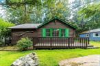 Very sweet and charming 3 season Cabin in terrific location. Large airy great room with vaulted ceilings has comfortable living and dining room with air conditioning. Spacious kitchen with pantry and and lots of storage space includes good sized island for dining or cooking. Home also has 2 comfortable bedrooms and 2 beautiful modern tiled baths. Enclosed porch provides additional space for guests or just family fun. Have dinner on your open deck or hang out on the front porch and enjoy the wildlife and peaceful country living. Lake and amenities available for low yearly fee or join pool club for swimming and weekend entertainment. Lots of things to do in area. Fine dining, Bethel Woods Performing Arts Center, Resort World Casino and Delaware River a short drive away for fishing , rafting and boating. This is truley a fabulous 3 season vacation getaway. Perfect for air BnB.