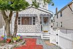 This beautifully updated detached two-family home located on a quiet, tree-lined block in Springfield Gardens. Sitting on a 30x100 lot, this move-in ready residence offers 3 bedrooms and 2 bathrooms. The first floor features an open-concept layout with a modern kitchen renovated in 2024, complete with a center island, stainless steel appliances, and hardwood floors that flow seamlessly throughout the home. Each bedroom is equipped with its own split-unit HVAC system, ensuring year-round comfort. A full basement provides excellent storage and utility space.Recent exterior updates include a new roof and siding (2024), enhancing curb appeal and peace of mind. The property also offers a private driveway and detached 1-car garage.Conveniently located near transportation, shopping, schools, and JFK Airport, this property combines modern upgrades, functionality, and a prime Springfield Gardens location.
