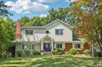 Stunning Brick & Hardie Plank East-Facing Colonial â€“ Pride of Ownership Shines Throughout. This spectacular 5-bedroom, 2-bath Colonial showcases a blend of timeless design and modern luxury. From the moment you step inside, the unique architectural details and thoughtfully designed spaces make a lasting impression.The first floor features an open, light-filled layout. A spacious living room with a cozy fireplace flows seamlessly into the elegant dining area, which opens to a sun-drenched patioâ€”perfect for indoor-outdoor living. The state-of-the-art gourmet kitchen is a chefâ€™s dream, complete with quartz countertops, stainless steel appliances, double pantry, and custom cabinetry. The luxurious primary suite is conveniently located on the main level, offering walk-in closets and a beautifully remodeled bathroom featuring marble counters, a walk-in shower, and jetted tub. Two additional bright and generously sized bedrooms are also located on the first floor. Upstairs, discover a unique and versatile layout with two oversized bedrooms, each with walk-in closets, a beautifully updated bathroom, and a separate laundry room. Step outside to enjoy the tranquil, landscaped backyardâ€”your own private retreat. An oversized two-car garage completes this exceptional property. Every detail has been thoughtfully curated. This home is truly a must-see!