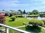 Beautiful Waterfront 1st Floor Co-op at Harbor House for rent Memorial Day - Labor day 2026. Walking distance to the highly sought after Westhampton Beach Downtown Village, as well as gorgeous Dune Rd beaches a bike ride away. The property is partly bulkheaded, ready for you to throw your kayaks in! Furnished and very clean and pretty. Entry foyer leads chic white waterfall countertop kitchen with all white appliances, spacious living room, sliders to large deck overlooking the water. Large heated, gated pool with loads of seating. Community laundry room on premises. Grab this one while its still available!