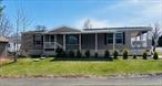 Back on market and available. Nicely maintained 2010,  3 bedroom, 2 bathroom double wide in the age 55 plus Community at Bells Pond. Large living room featuring a gas fireplace. Master bedroom with separate bathroom. Central air conditioning. On demand Generac generator. Covered porch. Car port. Storage shed. Nicely landscaped corner lot. Buyer must submit application and be approved by park management. Come take a look.