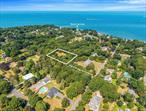 Discover the perfect canvas for your dream home at 702 Cedar Drive, East Marion. This tranquil 1.02 acre parcel nestled in the heart of the North Fork. Find a secluded wooded lot offering unparalleled privacy and a serene setting, ideal for crafting a custom retreat. Positioned just a short stroll from a deeded neighborhood beach, this property provides easy access to the tranquil waters of the Long Island Sound. Whether youâ€™re seeking a peaceful escape or a base for exploring the regionâ€™s renowned vineyards and charming villages, this location offers the best of both worlds. East Marion is celebrated for its natural beauty, offering residents and visitors alike a serene environment to unwind and enjoy outdoor activities. The area boasts a rich tapestry of local culture, is in close proximity to the beloved Kontokosta Vineyard, Islands End Golf Club and seconds from a vibrant Greenport Village. East Marion is one of the North Forkâ€™s best-kept secrets offering privacy, charm, and easy access to everything you love about the Northfork. Whether youâ€™re a builder, investor, or future homeowner, this offering is a rare find in a tightly held, upscale coastal enclave.