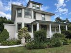 Welcome to this beautifully renovated 1918 Colonial, blending timeless charm with modern updates. This spacious 4-bedroom, 4.5-bath home sits on half an acre of park-like grounds and features a wraparound front porch, perfect for relaxing or entertaining.Inside, youâ€™ll find plenty of original woodwork alongside modern upgrades, including a brand-new kitchen with appliances and a classic butlerâ€™s pantry for added convenience.The exterior has been thoughtfully updated with a new driveway, fencing, and a detached 2-car garage with additional driveway space. (Garage not including)This home offers not just space, but a lifestyleâ€”the gateway to living on the North Shore of Long Island, with its beautiful landscapes, beaches, and vibrant communities.Donâ€™t miss the opportunity to call this unique Colonial your home.