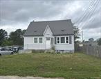 Cape Style Home. This Home Features 4 Bedrooms, 2 Full Baths, Formal Dining Room & 2 Car Garage. Centrally Located To All. Don&rsquo;t Miss This Opportunity!