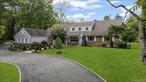 Welcome to this stunning 7-bedroom, 3.5-bath Colonial set on 2.1 private acres in a peaceful cul-de-sac within the Village of Old Westbury. With easy access to scenic horse trails and just minutes from New York City, this residence perfectly blends convenience with serene luxury. Step inside to find an expansive open layout featuring a gourmet kitchen with Viking appliances, granite countertops, and a spacious mudroom/laundry area. Each bedroom is generously sized with abundant closet space, while the finished lower level offers a movie theater, office, billiard room, and exceptional storage. The backyard is an entertainerâ€™s dreamâ€”featuring a saltwater pool with a diving board, waterfall, and built-in fire pit, surrounded by a secluded yard for ultimate privacy. Additional highlights include a circular driveway that accommodates up to 30 cars, a full-house backup generator (under a year old), a six-year-old roof and pool liner. This home offers both comfort and sophistication, designed for modern living and grand entertaining.