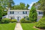 This charming Storybook Colonial is being offered for sale for the first time in 75 years! Loved and cared for by one family, this home has been thoughtfully expanded. Set on a beautiful, spacious lot, this sunlit Colonial features classic touches throughout, including a cozy, working fireplace in the living room, gleaming hardwood floors, and a generous, open kitchen ideal for family gatherings. With five bedrooms, a full attic, and a full basement with direct access to the backyard, this home provides ample space for living. The attached garage adds even more convenience, and the large lot offers the perfect setting for outdoor activities, gardening, or future expansion. While the home retains its original charm, renovate to make it your own. Whether you&rsquo;re looking to restore its vintage appeal or add modern touches, this home is brimming with potential and ready for its next chapter.