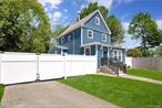 Huge Fully Renovated Colonial with space for multiple families. Located right across the street from the LIRR. Walking distance to super market and shopping center. New Roof, Siding, pvc fencing. Equipped with new walls, lighting, and flooring throughout. 3 new Bathrooms, brand new kitchens. Space for extended families.