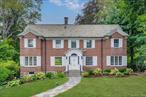 Welcome to 120 Lyncroft Road, a classic brick colonial set on one of New Rochelleâ€™s most coveted tree-lined streets. With timeless curb appeal and a spectacular setting, this home blends architectural elegance with everyday comfort. Sunlight fills the interiors, framing sweeping views of the propertyâ€™s extraordinary, park-like backyard from nearly every room. Hardwood floors run throughout, while features like the striking coffered ceiling in the living room and oversized windows set the tone for warmth and character. The backyard is the crown jewelâ€”expansive, private, and beautifully landscaped, it offers the perfect setting for entertaining, play, or quiet relaxation. With easy access from both the kitchen and dining room, indoor-outdoor living flows effortlessly. The gracious layout includes a sun-filled living room anchored by a wood-burning fireplace, a formal dining room, a bright kitchen that opens to a windowed breakfast room. Upstairs, spacious bedrooms continue the theme of light and views, while the finished third-floor attic is a standout. With rustic wooden beams, soaring ceilings, and oversized windows overlooking the backyard, itâ€™s ideal as a studio, office, or retreat. The homeâ€™s foundation of timeless materials and craftsmanship makes it an exciting opportunity to create a dream residence tailored to your style. Located in one of the most desirable sections of New Rochelle, 120 Lyncroft Road combines classic architecture, a remarkable lot, and a neighborhood that remains highly sought-after. A rare opportunity with a backyard that truly feels like your own private park.