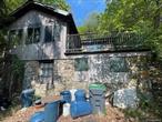 Hillside Stone Cottage on Oversized Lot in Greenwood Lake!This property needs complete renovation. As it exists, there is a 556 SF hillside stone cottage that&rsquo;s been gutted and undergoing renovations and a stone storage shack that could be used as a guest cottage if updated. An assemblage of 5 lots (41, 42, 44, 45, 46) for a total combined land area of approx. 35, 210 SF or 0.808 acres of land. The property is located in the southwestern corner of Orange County along the New Jersey border in the village of Greenwood Lake. Property features:- 2 Bedrooms/ 1 Bathroom - Fireplace- Full Unfinished Basement - Stone Storage Shack- Large Patio- House: 556 SF - Land: 35, 210 SF or 0.808 Acres- RE Taxes: $4800/Yr- Steps away from Greenwood Lake*Disclaimer: All Information provided is deemed reliable but is not guaranteed and should be independently verified.