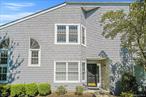 End unit in Desirable Gated Lakebridge Club Community. This Wynfield model offers two bedroom, two full bath, granite counters, stainless steel appliances, laminate floors throughout, washer & dryer, lots of natural sunlight, deck, 1 car garage. Community offers playground, tennis & pickle ball, inground pool, community center, fitness center, library & pool table.  Near shopping, restaurants & parks. Make this dream home yours today!!