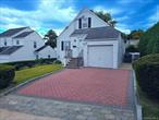 Opportunity Awaits! Introducing this charming 3-bedroom Cape Cod-style home, nestled on a beautifully landscaped lot in the desirable Dunwoodie section of Yonkers. This home offers single-level living with hardwood floors throughout. The first floor features two bedrooms, while a complete set of stairs leads to two additional bedrooms on the second floor, providing great potential for expansion or customization. The property also includes an attached 1-car garage and additional driveway parking. Enjoy a prime location with convenient access to buses, trains, and major parkways, just a 30-minute train ride to Grand Central Station. Although the home needs some TLC, it presents a fantastic opportunity to renovate and make it your own.
