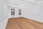 This is a rare and highly desirable opportunity for doctors, healthcare providers, or medical practitioners to establish a fully functional live/work space in a central, convenient location. The unit features several rooms and one bathroom that can be reconfigured to meet professional and residential needs, making it perfect for a medical practice with exam rooms, consultation offices, a welcoming reception area, and administrative spaces, while still accommodating private living quarters. From the moment you enter, the property impresses with high ceilings, oversized windows, and hardwood floors throughout, creating a bright, professional, and inviting atmosphere for patients and residents alike. Natural light enhances comfort and productivity, while hardwood floors provide timeless style and easy maintenance. Located in a clean, well-maintained building, the unit benefits from a doorman for security and a professional welcome, a live-in superintendent for prompt assistance, and on-site laundry facilities for convenience. The building is pet friendly, offering lifestyle flexibility for live/work residents. Its central location is ideal, with schools, shops, restaurants, and banks nearby, plus easy access to public transportation and major highways. Only fifteen minutes from Midtown East or West, commuting is seamless, and car-free convenience is possible. Adding to the peace of mind, a police station and courthouse are directly across the street, providing a heightened sense of safety for patients, staff, and residents. The flexible layout allows medical professionals to create a thriving practice while maintaining private living space, making it a true live/work opportunity. Combining professional utility, residential comfort, prime location, and exceptional safety, this property is exceptionally rare. Opportunities like this for medical use do not come to market oftenâ€”secure this versatile live/work property before itâ€™s gone.