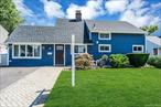 Location, Location, Location! Excellent 4BR, 1.5 Baths Cape with numerous updates in a Beautiful neighborhood featuring sidewalks. Updates include: Roof (2024), Siding (2023), Windows (2023), Oil Burner (2023), Full Bath (2022), and Floors (2016). Kitchen with granite countertops. Large Entertainment room. Could be a primary Bedroom. Living room, Dining room/area with a fireplace. Cozy sunroom. Patio, fenced yard with an abundance of blooming flowers. Close to schools, shopping, library, and parks. Easy access to major highways.