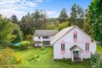 Currently home to a celebrated local artist and musician, this extraordinary reimagined church compound offers a rare opportunity to live, work, and create in a truly one-of-a-kind setting. Encompassing nearly 10, 000 square feet across multiple structures, the property blends historic character with modern adaptability, making it an inspired choice for artists, entrepreneurs, and visionary investors. The former dining hallâ€”an impressive 33&rsquo; x 76&rsquo; space with soaring ceilings and abundant north-facing lightâ€”now serves as a painting studio and includes an eat-in kitchen with a spacious master suite above. The converted church, complete with original stained glass windows from 1897 and choir loft bedroom, offers a 35&rsquo; x 50&rsquo; open floor plan currently used as a music room for recording and rehearsal. Outside, beautifully landscaped grounds surround a heated saltwater pool and lush perennial gardens, creating a private oasis. A 2, 400-square-foot, three-bedroom farmhouse with master suite, formal dining room, living room, sunroom, full basement, and detached two-car garage adds both versatility and income potential, fronting the property with classic charm. With the appropriate approvals, zoning allows for a wide variety of future uses, including an art gallery, retreat center, bed-and-breakfast or inn, restaurant, retail or antique shop, or health and educational facility. Perfectly located at the epicenter of the Mid-Hudson Valley, the property is close to the NYS Thruway and just minutes from Saugerties Village, the Woodstock Colony of the Arts, Kingston, Rhinebeck, and Hudson, and only 30 minutes to skiing at Hunter Mountain. A truly singular offering, unlike anything else on the market.