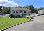 Welcome to 8 Heather Court Middle Island! A Pristine high ranch fully remodeled in 2017. Includes 3 bedrooms, 3 full baths, updated kitchen with stainless steel appliances, oak hardwood floors, LED lighting throughout, oversized 2-car garage with 50 amp plug for EV charging, 200 amp electric service, high - efficiency gas heat, central ac, TimberTech back deck, with fully fenced backyard, 5-zone sprinklers, Beautiful cultured stone and Shakes on the front exterior with a 40-year architectural shingle roof. Situated on approx one acre in a Quiet Middle Island cul-de-sac.