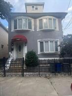 2 family, 3-bedroom over a 3-bedroom with a finished basement, backyard, and two-car detached garage. The two apartments can easily be made into 4 bedrooms and a walk-in attic the length of the house.